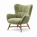 Sillón orejero de tela bouclé verde con patas de madera 100x85x80 cm